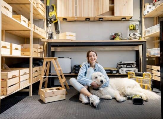 woman with a dog in the workshop 2021 09 02 04 29 22 utc